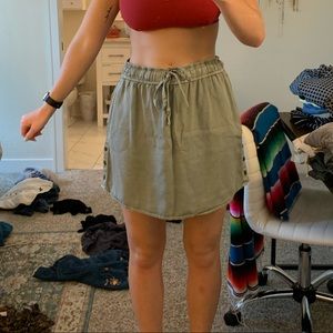 Sage green skirt with pockets